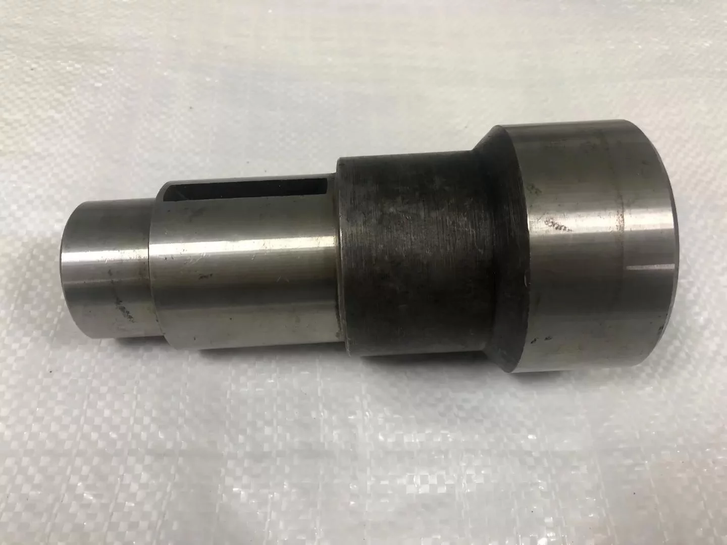 купить Вал промежуточный 214 делителя со шпоночным пазом / КМД